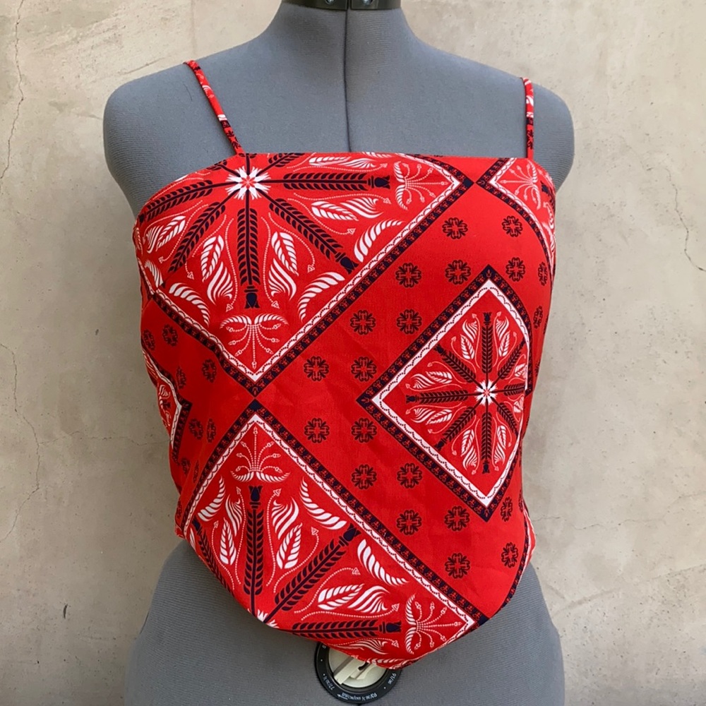 super trendy super cute bandanna top that ties in the back. Fits super nice